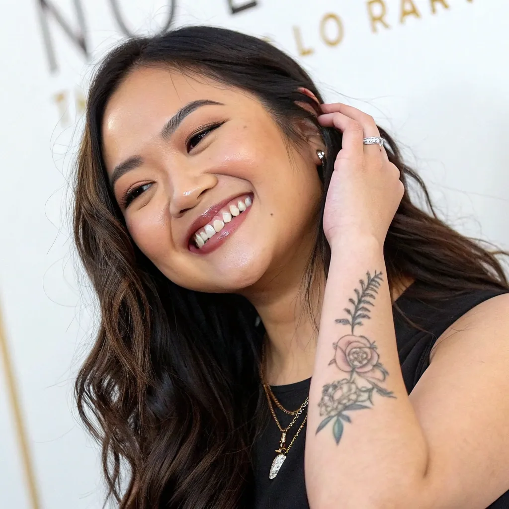 Sarah Nguyen with a delicate wrist tattoo